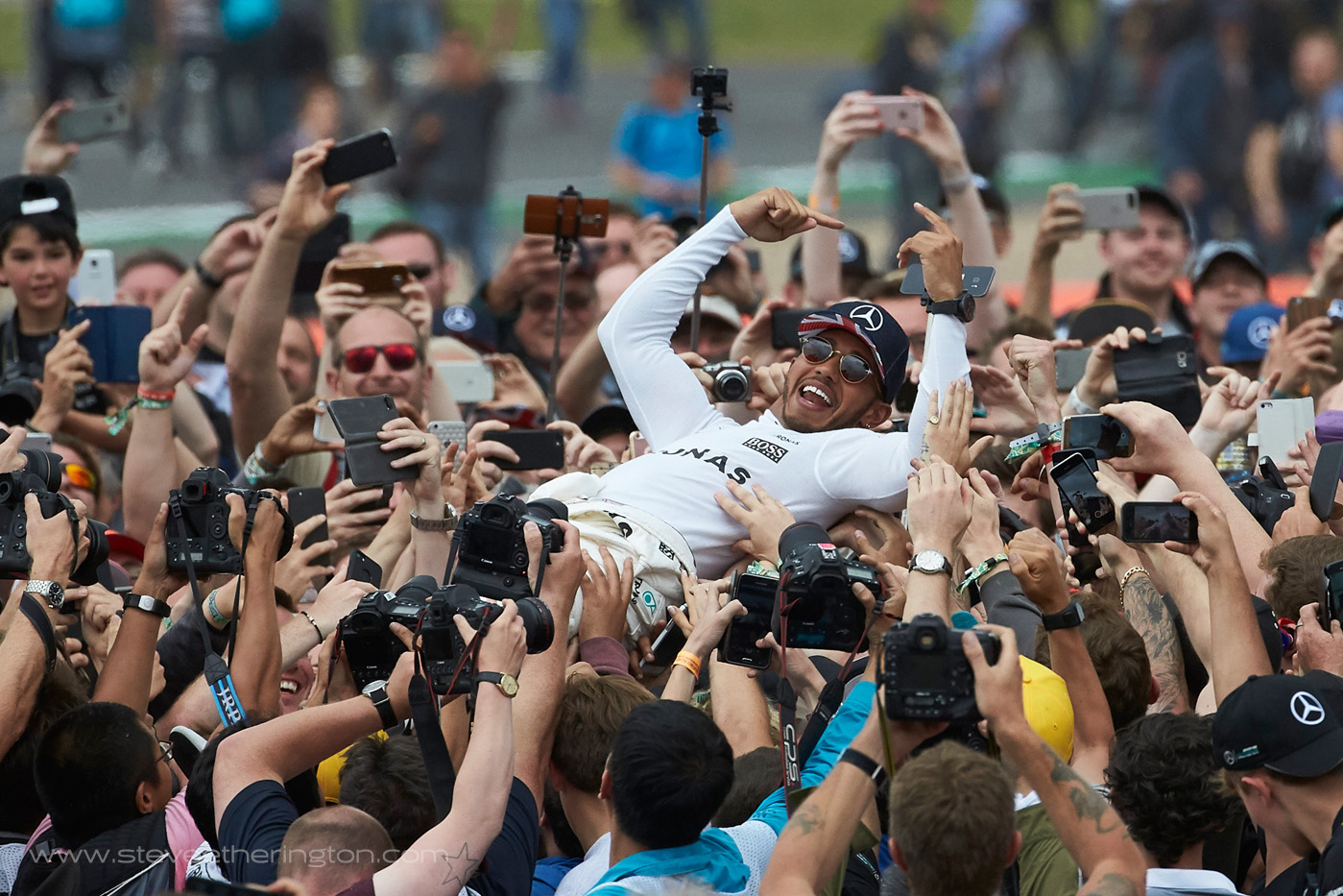 Lewis Hamilton surfs photography frenzy